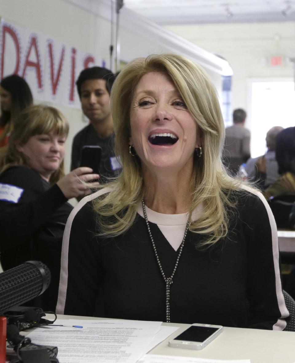 Texas Sen. Wendy Davis, D-Fort Worth, laughs as she speaks to supporters at her campaign headquarters Tuesday, March 4, 2014, in Fort Worth, Texas. Now the Texas governor's race really begins and Davis insists that, yes, it'll be a race. (AP Photo/LM Otero)