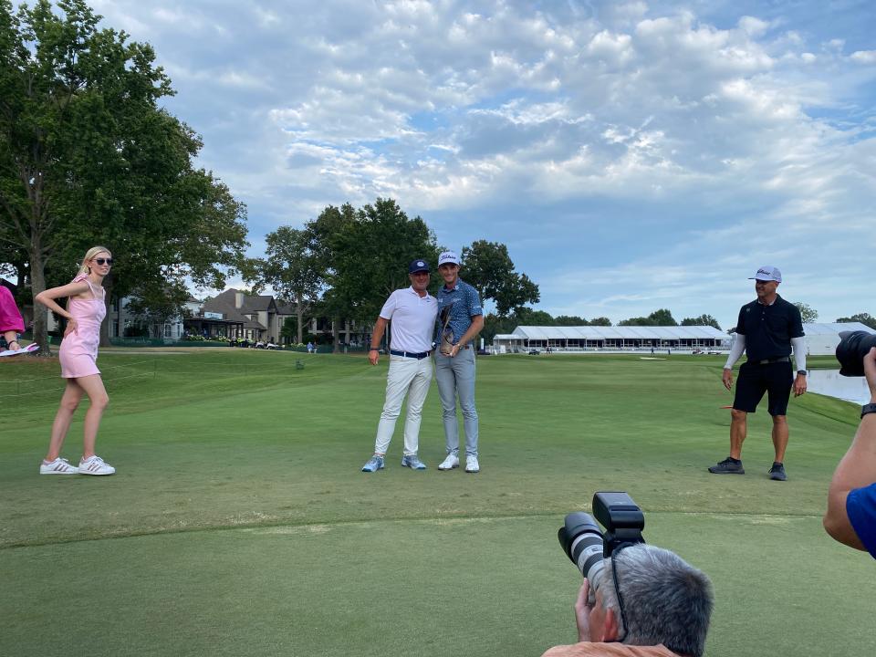 Will Zalatoris, right, poses for a photo with his coach Josh Gregory, a Memphis native, after winning the FedEx St. Jude Championship Sunday at TPC Southwind.