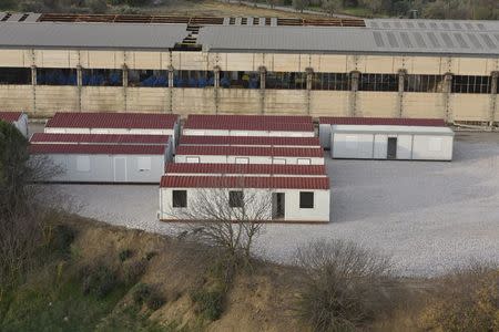 Prefabricated houses are seen at a site for registering refugees and migrants on the Greek island of Chios, in this handout photo released by the Greek Prime Minister's Office on December 15, 2015. REUTERS/Greek Prime Minister's Office/Handout via Reuters