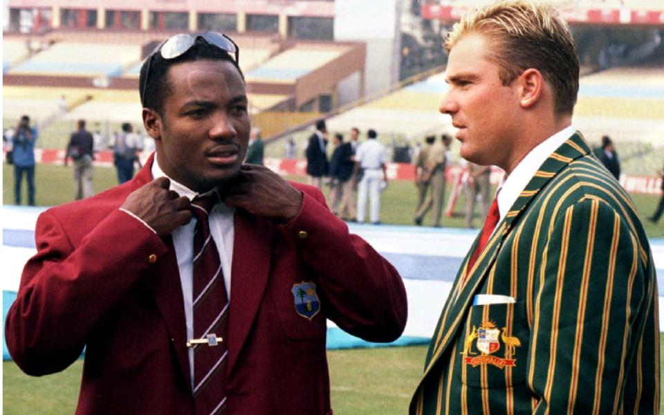 West Indian batsman Brian Lara (L) chats with Australian bowler Shane Warne after a photocall February 11 1996 - Russell Boyce/REUTERS