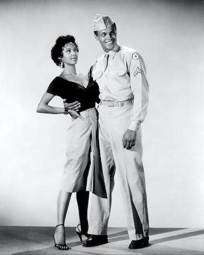 Dorothy Dandridge and Harry Belafonte in the 1954 film ‘Carmen Jones.’ <a href="https://www.gettyimages.com/detail/news-photo/actors-dorothy-dandridge-and-harry-belafonte-in-a-publicity-news-photo/686940153?adppopup=true" rel="nofollow noopener" target="_blank" data-ylk="slk:Silver Screen Collection/Getty Images;elm:context_link;itc:0;sec:content-canvas" class="link ">Silver Screen Collection/Getty Images</a>