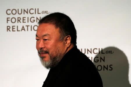 Chinese artist and dissident Ai Weiwei walks to the stage to speak at the Council on Foreign Relations in the Manhattan borough of New York City, U.S., November 2, 2016. REUTERS/Mike Segar