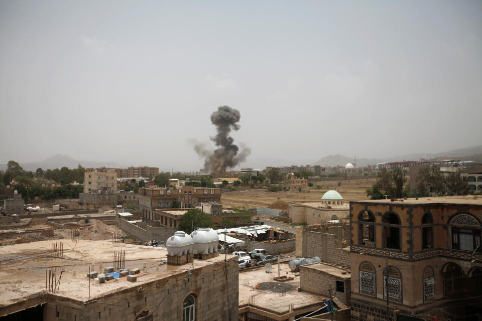 <p>Smoke rises after an airstrike in Sanaa, Yemen, Aug. 9, 2018. (Photo: Mohamed al-Sayaghi/Reuters) </p>