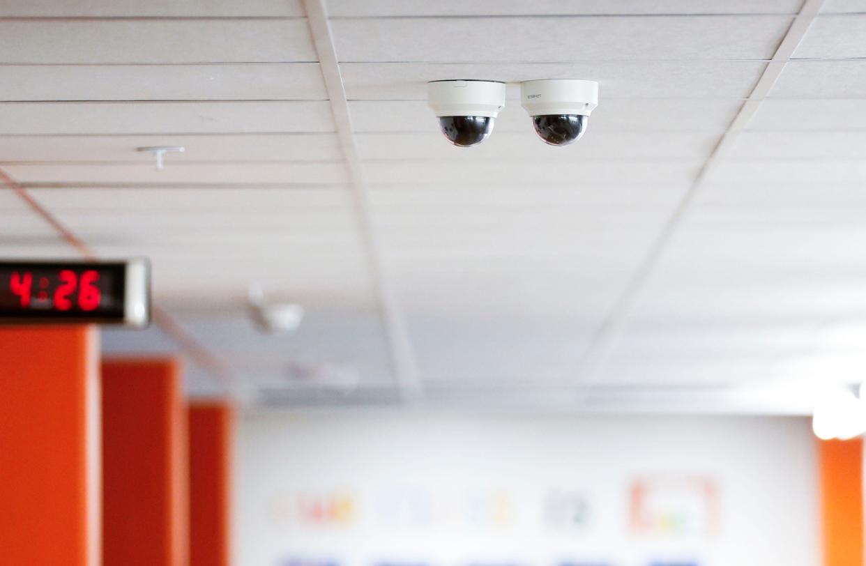 Security cameras are shown in a Missouri high school.