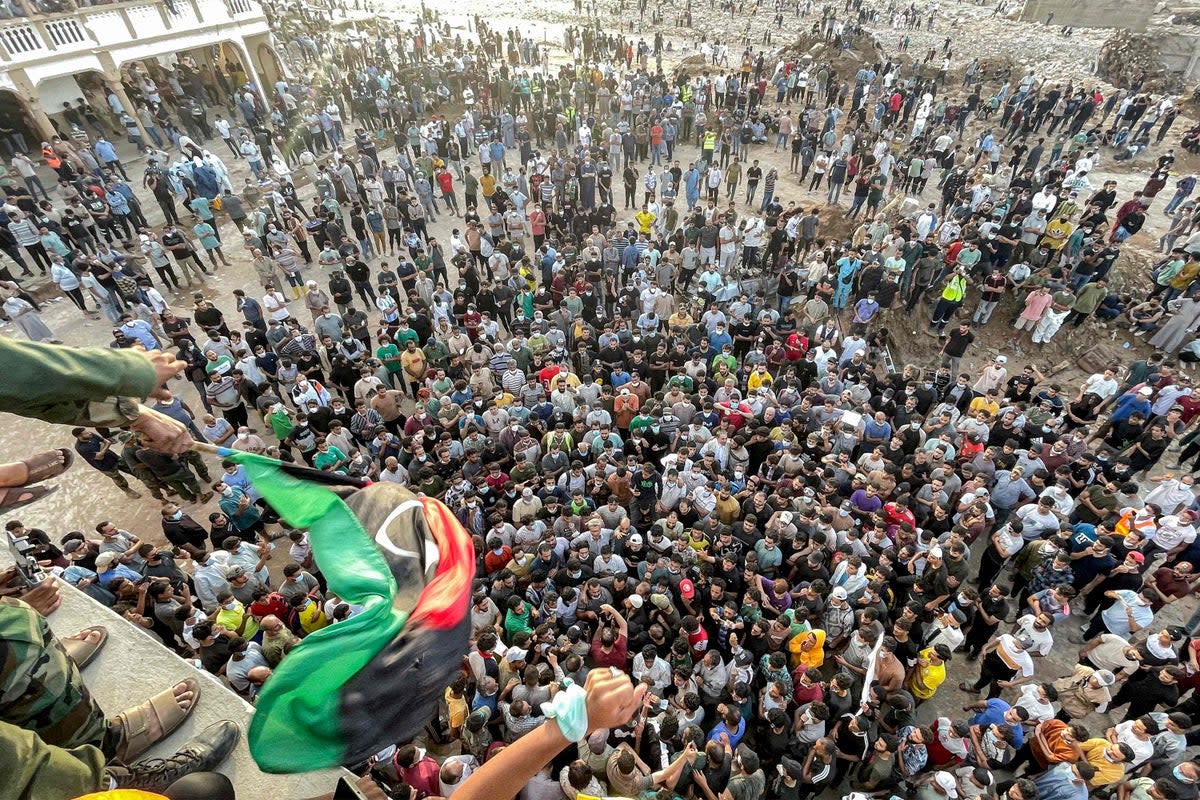 People gather for a demonstration outside the al-Sahaba Mosque in the city (AFP via Getty)