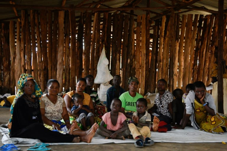 The UN says there are about 25 million refugees globally -- here, a refugee family from the Democratic Republic of Congo (DRC) wait in a makeshift shelter before their registration at a settlement in western Uganda