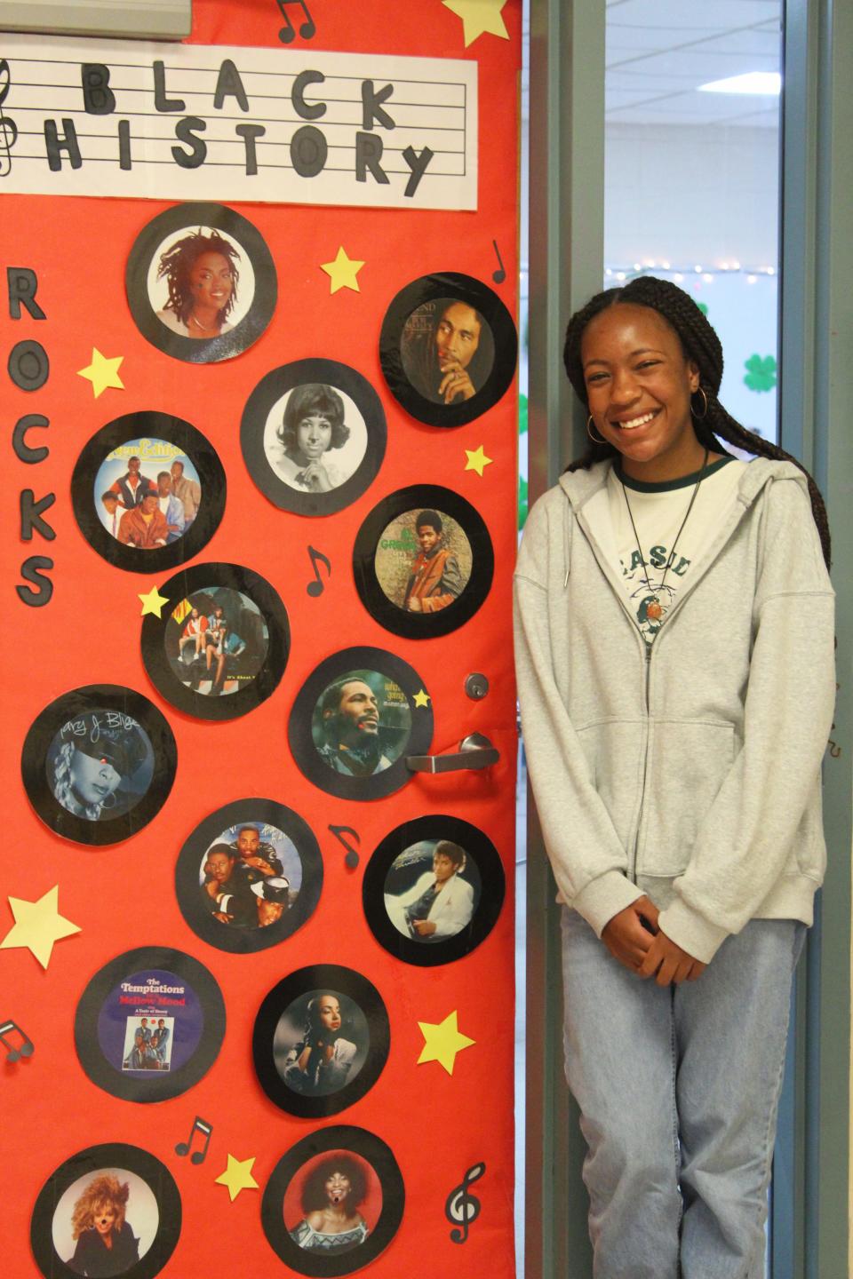 Barnstable High School student Kaylee McFarland, 13, a pianist and a singer, based her classroom door display on music with images of Black musicians including Marvin Gaye, Michael Jackson and Mary J. Blige.