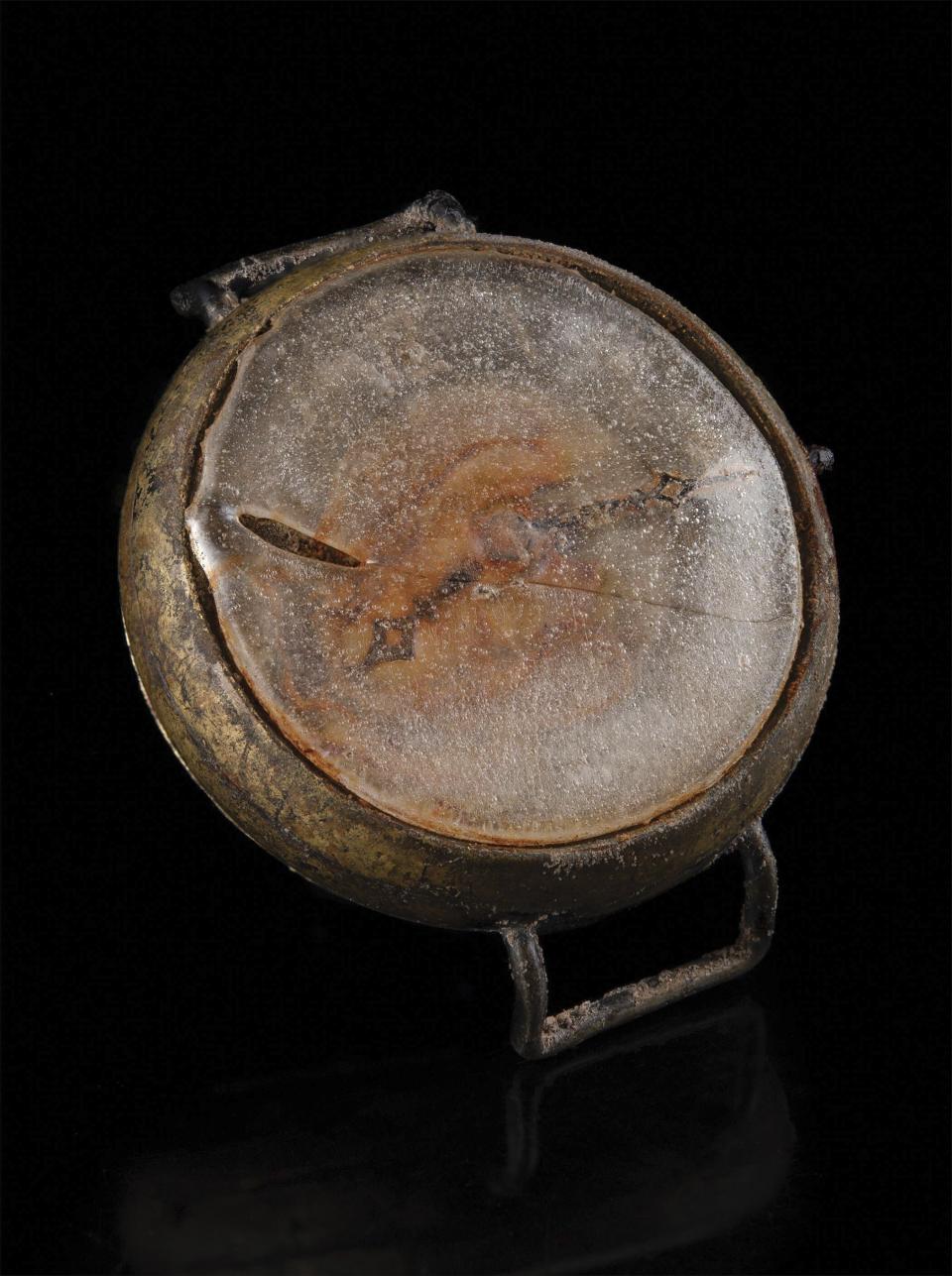 This photo provided by RR Auction shows a watch melted during the Aug.6, 1945 bombing of Hiroshima. The watch is frozen in time at the moment of detonation of the atomic bomb over the city during the closing days of World War ll, sold at auction Thursday, Feb. 22, 2024 for more than $31,000. (Nikki Brickett/RR Auction via AP)