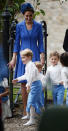 <p>Kate Middleton looked stunning in a blue Catherine Walker coat and matching lace dress. Photo: Australscope </p>