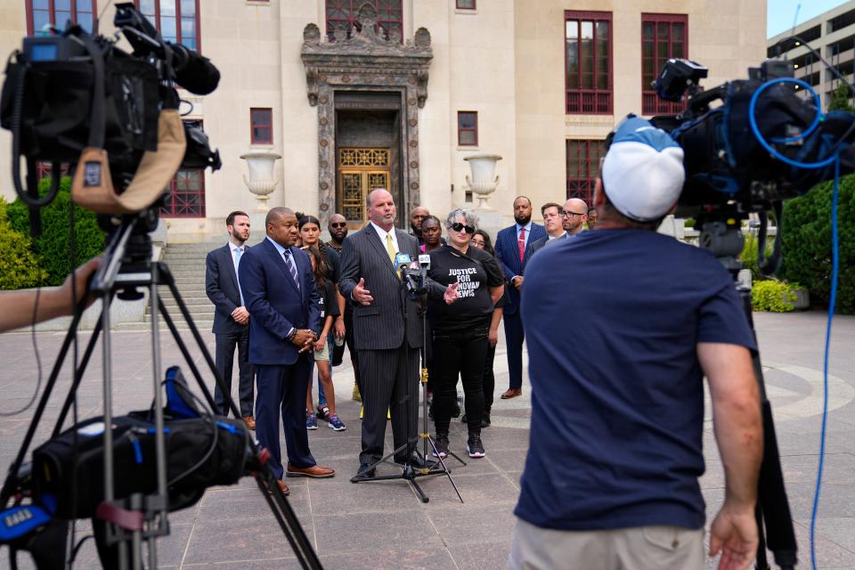 Attorney Rex Elliott and the family of Donovan Lewis held a press conference Thursday outside Columbus City Hall.