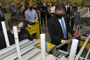 United States Secretary of Labor Marty Walsh tours First Solar's factory in Lake Township, Ohio.