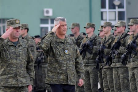 Kosovo's President Hashim Thaci attends a ceremony of security forces a day before parliament's vote on whether to form a national army, in Pristina, Kosovo, December 13, 2018. REUTERS/Laura Hasani