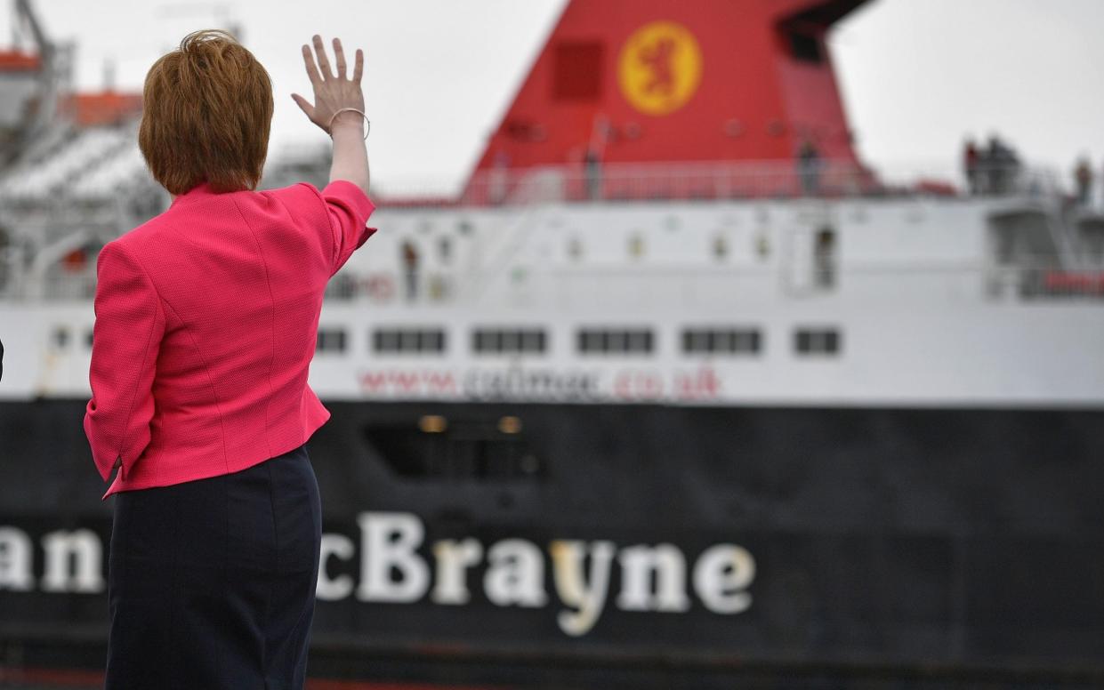 Nicola Sturgeon waves off a CalMac ship in 2016, years before the ‘ferry fiasco’ - Jeff J Mitchell/Getty