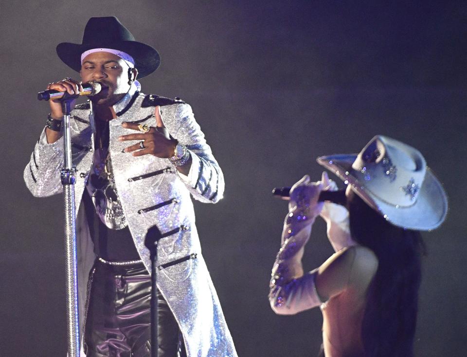 Jimmie Allen (left) and Noah Cyrus perform at the 2020 CMT Music Awards.