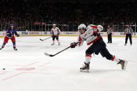 NEW YORK, NY - APRIL 30: Alex Ovechkin #8 of the Washington Capitals attempts a shot on goal in the third period in Game Two of the Eastern Conference Semifinals during the 2012 NHL Stanley Cup Playoffs at Madison Square Garden on April 30, 2012 in New York City. (Photo by Bruce Bennett/Getty Images)