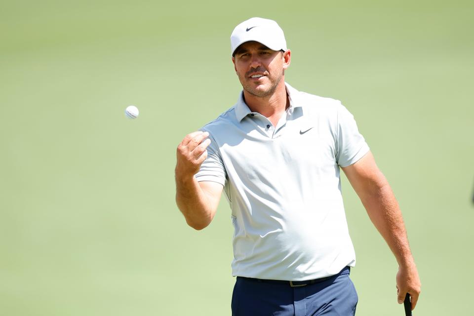 PINEHURST, NORTH CAROLINA - JUNE 11: Brooks Koepka of the United States tosses his ball on the 16th green during a practice round prior to the U.S. Open at Pinehurst Resort on June 11, 2024 in Pinehurst, North Carolina. (Photo by Alex Slitz/Getty Images)