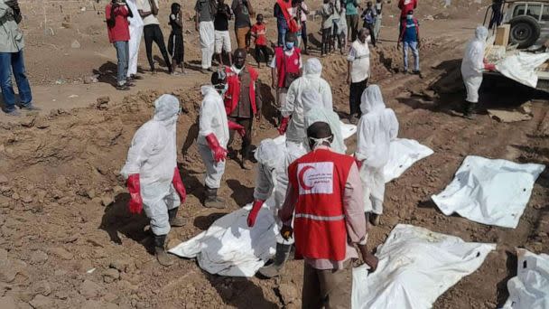 PHOTO: Members of the Sudanese Red Crescent Society work with volunteers to move bodies at Al-Shaqilab Cemetery in Khartoum, Sudan, in a photo taken on May 10, 2023, and released by the society. (Sudanese Red Crescent Society)