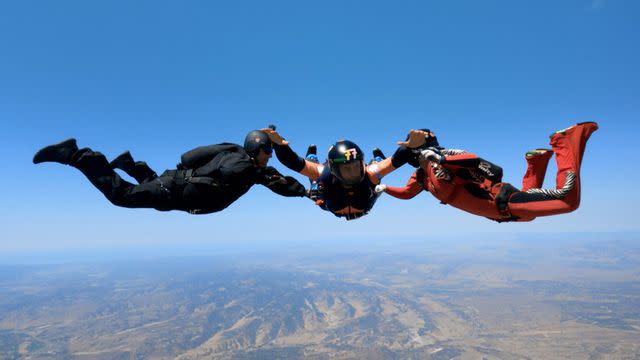 <p>Casey Durkin/PEACOCK</p> Orlando Bloom skydiving in 'Orlando Bloom: To The Edge' on Peacock.