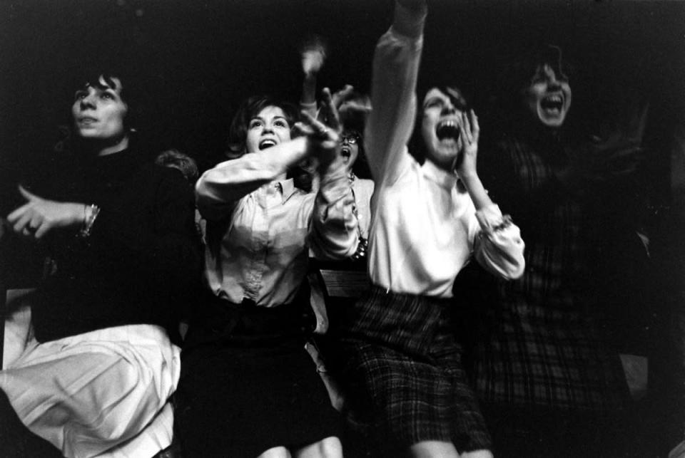 Not published in LIFE. Fans at the first Beatles concert in America, Washington, DC, Feb. 11, 1964. (Stan Wayman—Time & Life Pictures/Getty Images) <br> <br> <a href="http://life.time.com/culture/the-beatles-rare-early-photos-of-beatlemania-in-1964/#1" rel="nofollow noopener" target="_blank" data-ylk="slk:Click here to see the full collection at LIFE.com;elm:context_link;itc:0;sec:content-canvas" class="link ">Click here to see the full collection at LIFE.com</a>