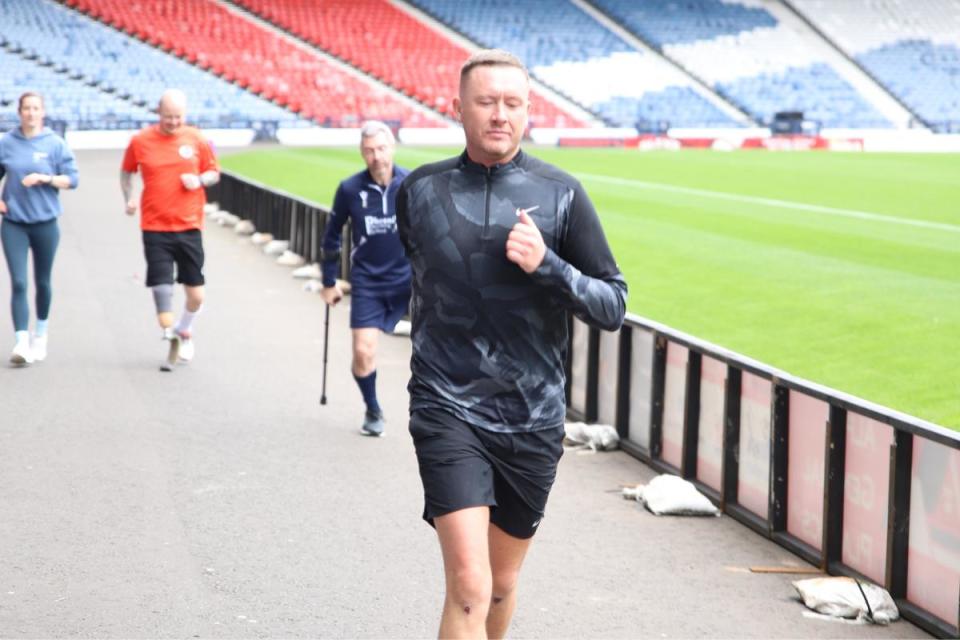 His journey started at Motherwell FC’s Fir Park at 6.30am, passing through Hamilton Accies, Celtic Park, Firhill, and Ibrox before concluding his run at Hampden Park <i>(Image: Daniel Morup Pedersen)</i>