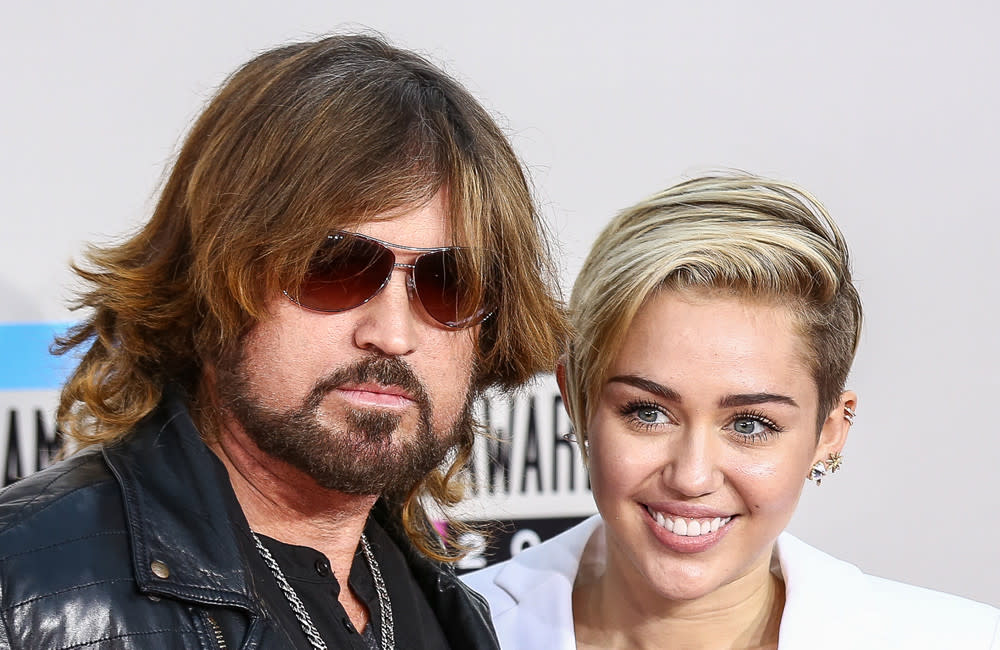 Miley Cyrus is struggling to connect with her dad credit:Bang Showbiz