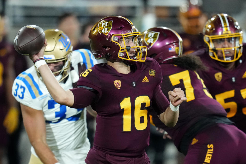 Arizona State quarterback Trenton Bourguet (16) throws a pass against UCLA during the first half of an NCAA college football game in Tempe, Ariz., Saturday, Nov. 5, 2022. (AP Photo/Ross D. Franklin)
