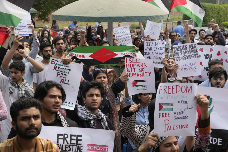 University students take part in rally against the Israeli airstrikes on Gaza and to show solidarity with Palestinian people, in Lahore, Pakistan, Friday, May 10, 2024. (AP Photo/K.M. Chaudary)