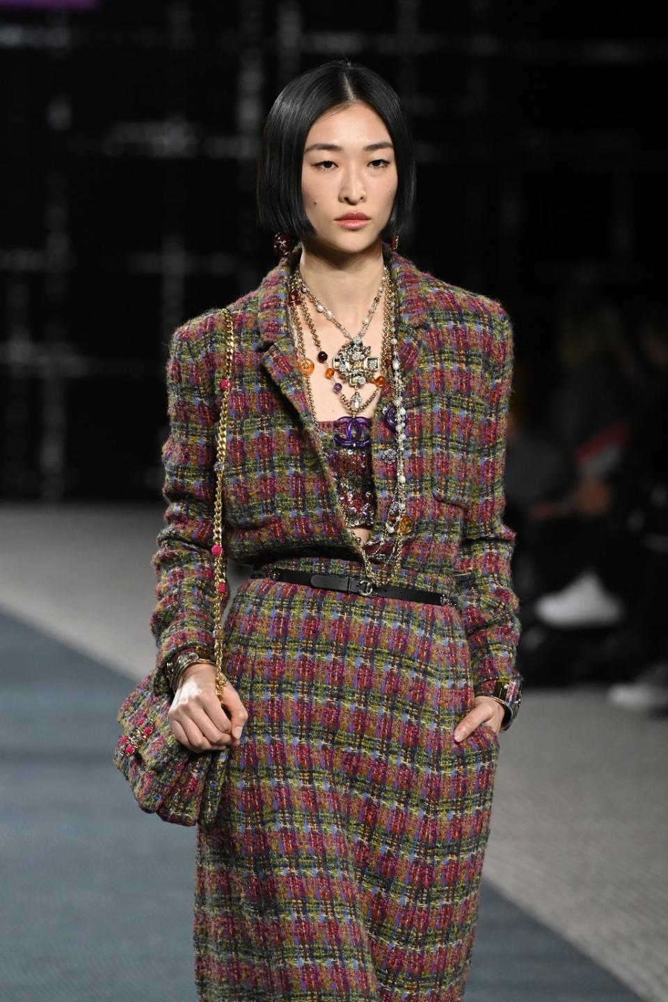 A model walks in the Chanel A/W 2022 show at Paris Fashion Week (Getty Images)