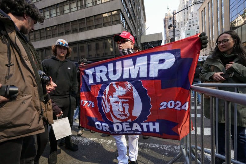 Supporters of former President Donald Trump rally outside Trump Tower in New York City after a grand jury indicted him on April 3. File Photo by John Nacion/UPI