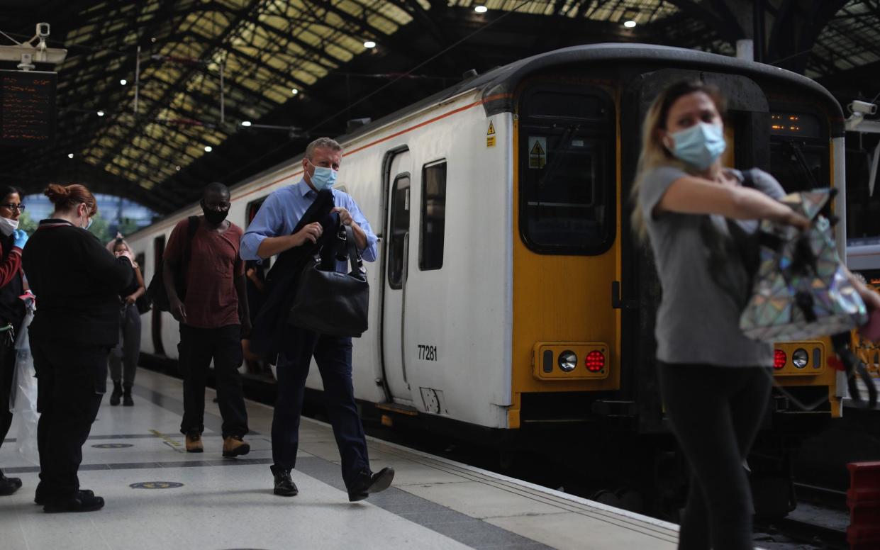 Business leaders have urged the Government to scrap 'outdated' yearly fares rises to encourage rail users to return to their offices - Simon Dawson/Bloomberg