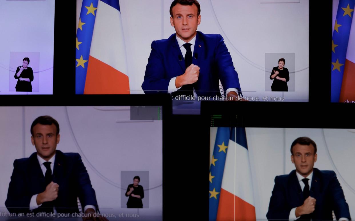 President Emmanuel Macron speaking during a televised address to the Nation on the Covid-19 pandemic and lockdown measures in France - AFP