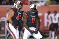 Utah linebacker Devin Lloyd (0) reacts after sacking Arizona State quarterback Jayden Daniels during the second half of an NCAA college football game Saturday, Oct. 16, 2021, in Salt Lake City. (AP Photo/Rick Bowmer)