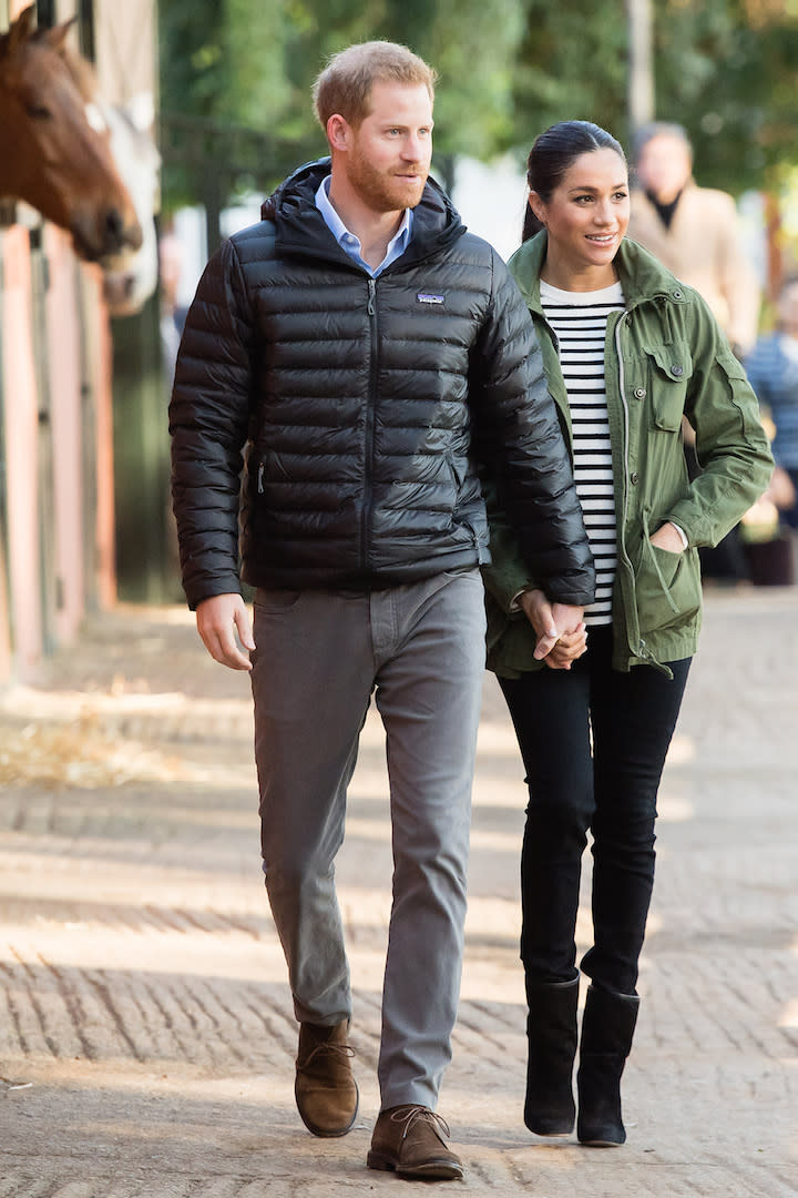 <p>For a trip to the Moroccan Royal Federation of Equestrian Sports, the royal mother-to-be wore a striped top by French label Equipment with her go-to J. Crew ‘Field Mechanic’ jacket. To finish the daytime look, she wore Rag & Bone skinny maternity jeans and Stuart Weitzman boots. <em>[Photo: Getty]</em> </p>