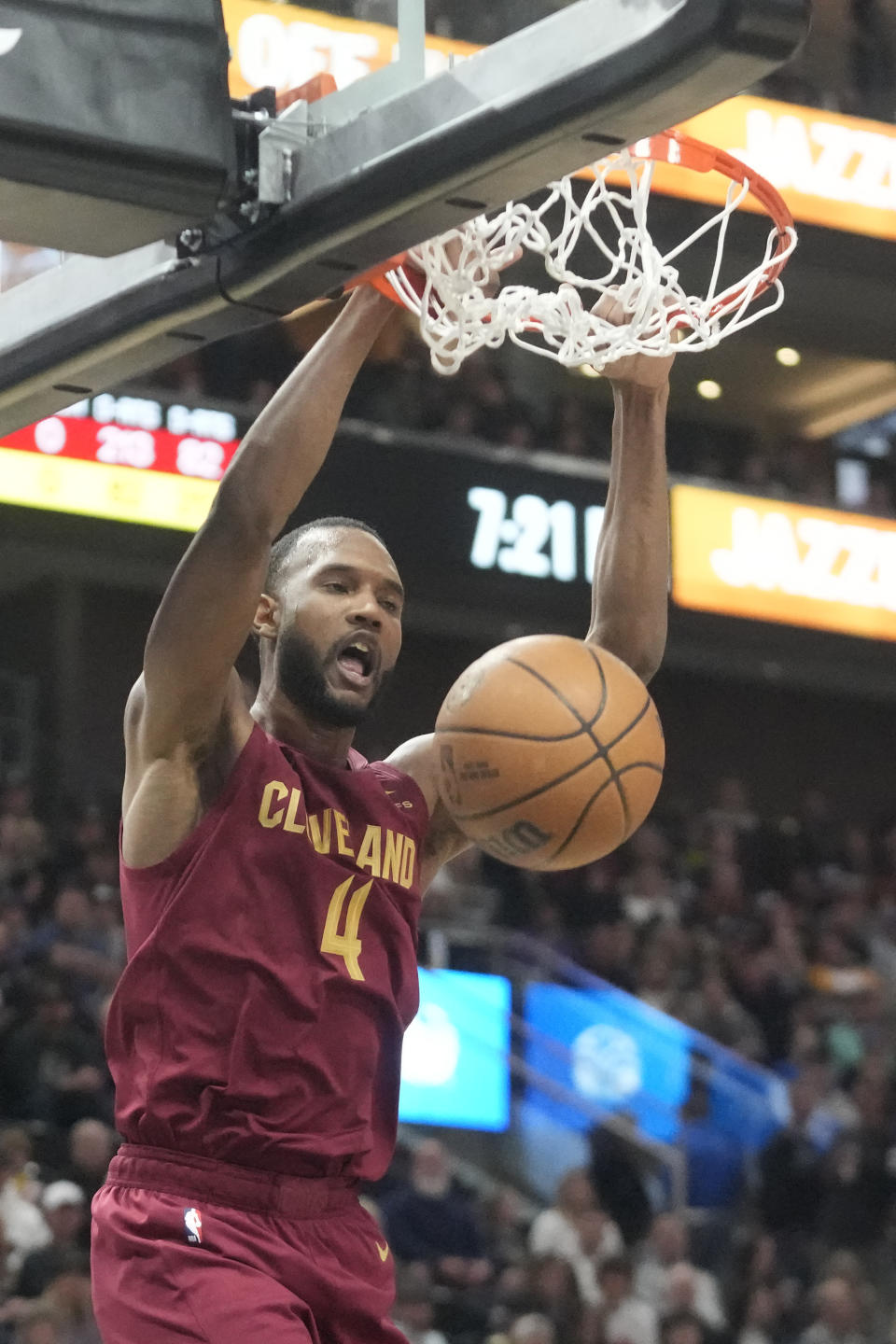 Cleveland Cavaliers forward Evan Mobley dunks against the Utah Jazz during the first half of an NBA basketball game Tuesday, April 2, 2024, in Salt Lake City. (AP Photo/Rick Bowmer)