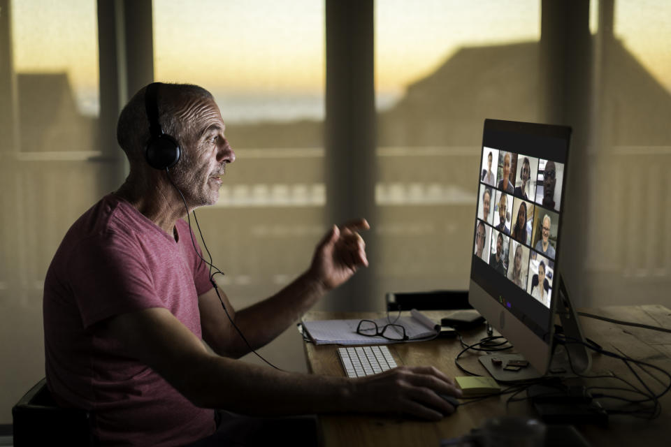 Man working from home in Zoom meeting