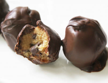 <div class="caption-credit"> Photo by: Julie Van Rosendaal</div><b>Peanut Butter Chocolate Chip Cookie Dough Truffles</b> <br> Cookie dough + peanut butter + chocolate ... does it get any better?! Why not give everyone something that they really want - a decadent cookie dough truffle that appeals to their inner child! <br> <a href="http://www.babble.com/best-recipes/7-easy-decadent-chocolate-confections-you-can-make-at-home/#peanut-butter-chocolate-chip-cookie-dough-truffles" rel="nofollow noopener" target="_blank" data-ylk="slk:Get the recipe;elm:context_link;itc:0;sec:content-canvas" class="link "><i>Get the recipe</i></a> <br>