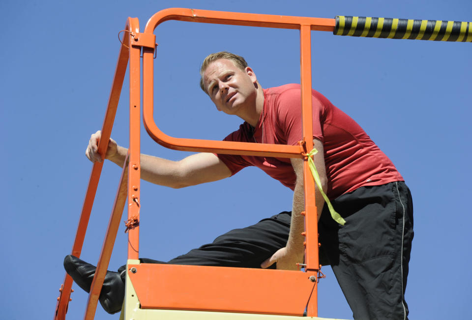 Wallenda stretches before attempting a practice wire walk at the Seneca Niagara Casino in N. Falls, N.Y. The walk will be the ultimate test of his physical and mental endurance.