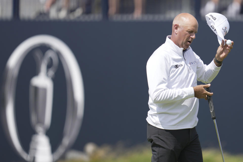 United States' Stewart Cink acknowledges the crown on the 18th green after completing his 1st round on the first day of the British Open Golf Championships at the Royal Liverpool Golf Club in Hoylake, England, Thursday, July 20, 2023. (AP Photo/Kin Cheung)