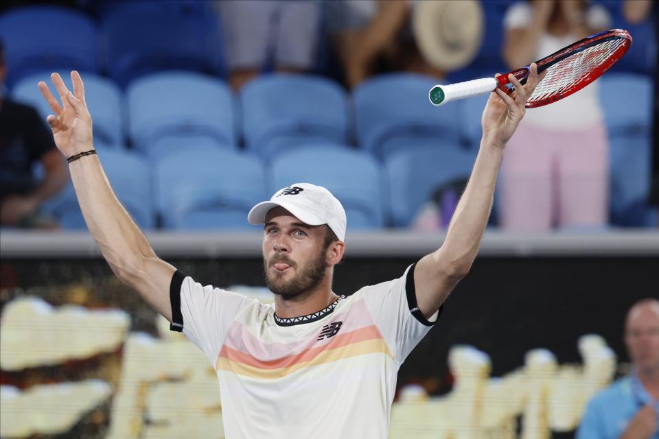 Tommy Paul of the U.S. reacts after defeating Roberto Bautista Agut of Spain in their fourth round match at the Australian Open tennis championship in Melbourne, Australia, Monday, Jan. 23, 2023. (AP Photo/Asanka Brendon Ratnayake)