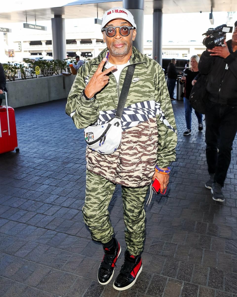 If we're not mistaken, Spike Lee's bag is juuuuust the right size to hold his brand-new Oscar.