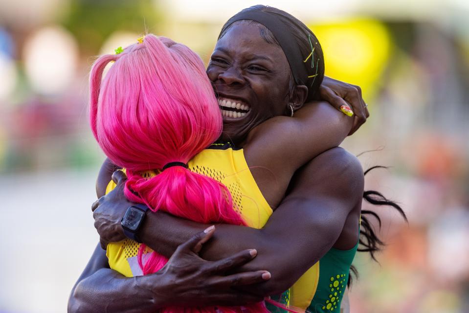 Jamaica's Shericka Jackson, right, is congratulated by teammate Shelly-Ann Fraser-Pryce after she won gold in the women's 200 meters on day seven of the World Athletics Championships at Hayward Field in Eugene, Ore., on Thursday, July 21, 2022.