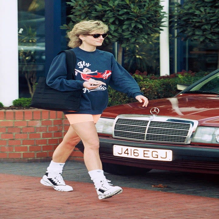 Princess Diana, Princess of Wales, wearing Virgin Atlantic sweatshirt and shorts, leaves Chelsea Harbour Club, London on November 01, 1995 in London, England