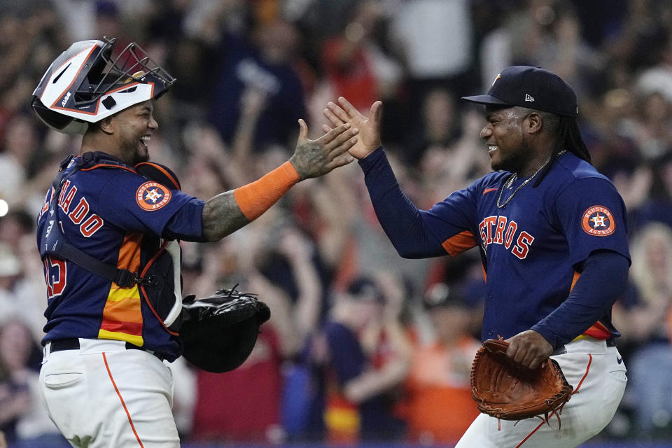 Houston Astros starting pitcher Framber Valdez, right, celebrates with catcher Martin Maldonado after throwing a no-hitter against the Cleveland Guardians, Tuesday, Aug. 1, 2023, in Houston. (AP Photo/Kevin M. Cox)