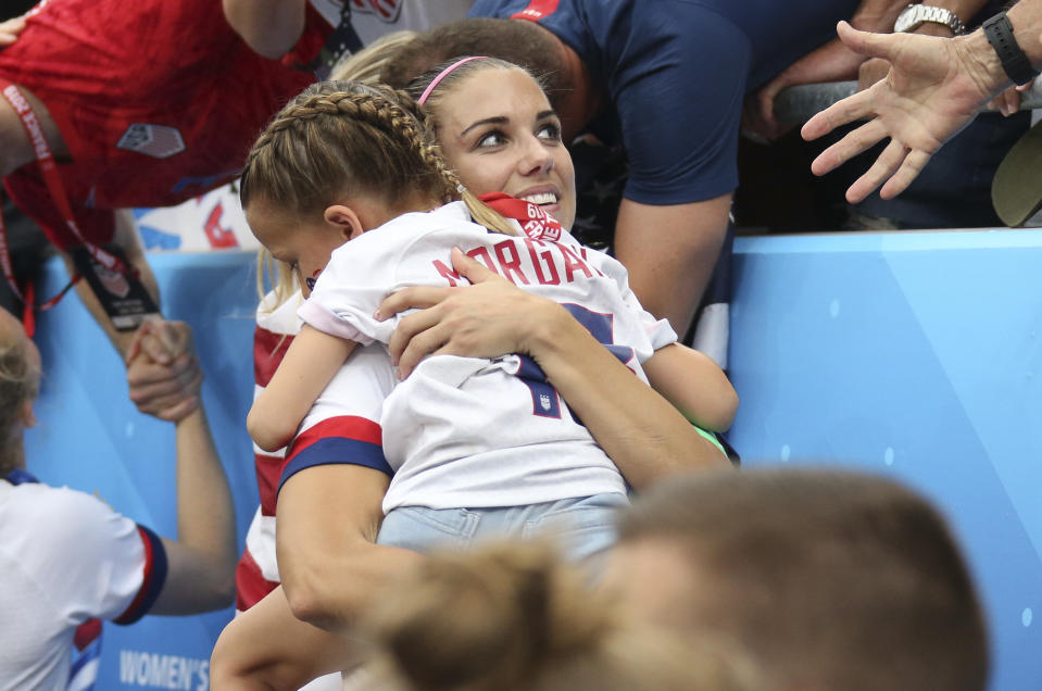 Alex Morgan of USA celebrates winning the title of World Champions following the 2019 FIFA Women's World Cup France Final match between The United States of America and The Netherlands at Stade de Lyon on July 7, 2019 in Lyon, France. (Photo by Jean Catuffe/Getty Images)