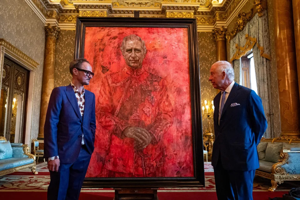 Artist Jonathan Yeo and King Charles III stand in front of the portrait as it is unveiled in the blue drawing room at Buckingham Palace on May 14, 2024 in London, England. (Photo by Aaron Chown-WPA Pool/Getty Images)