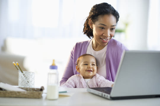 Returning work emails is a snap when there’s a smiling, calm baby on your lap.