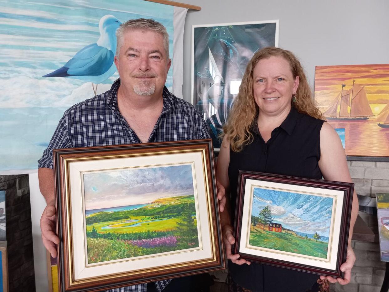 Wayne Maloney and Michelle Penney Rowe were smiling after being reunited with some of the artwork that has been missing for years when the Doctor's House Inn & Spa closed.