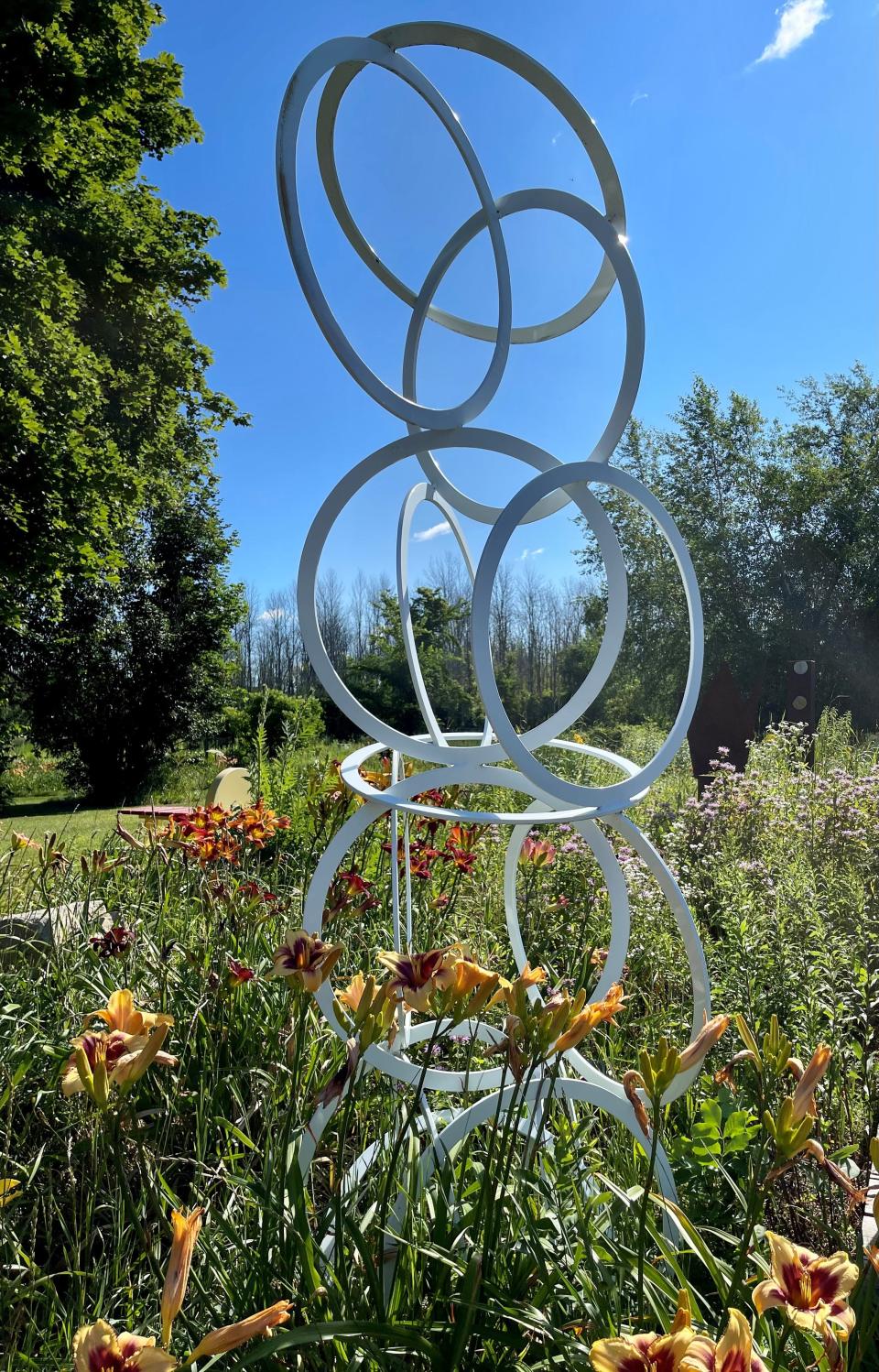 One of artist Robert Anderson's sculptures is a focal point of the sprawling daylily gardens on the rural Door County property where he and wife Ann find inspiration in nature.