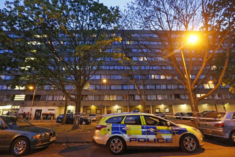 Cordon: Police in Battersea after the teenager was stabbed to death (NIGEL HOWARD)