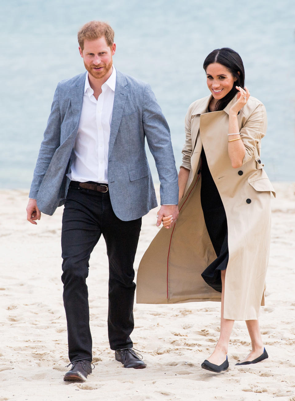 Prince Harry and Meghan Markle kept their shoes on for their beach visit in South Melbourne. Source: Getty